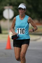 Karen Pearce placed second in her age groun at the Army Dillo half-marathon and 32K race.

Filename: SRM_20080921_1056446.jpg
Aperture: f/4.0
Shutter Speed: 1/2500
Body: Canon EOS-1D Mark II
Lens: Canon EF 300mm f/2.8 L IS