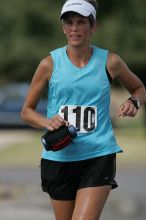 Karen Pearce placed second in her age groun at the Army Dillo half-marathon and 32K race.

Filename: SRM_20080921_1056460.jpg
Aperture: f/4.0
Shutter Speed: 1/2500
Body: Canon EOS-1D Mark II
Lens: Canon EF 300mm f/2.8 L IS