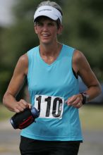 Karen Pearce placed second in her age groun at the Army Dillo half-marathon and 32K race.

Filename: SRM_20080921_1056462.jpg
Aperture: f/4.0
Shutter Speed: 1/2500
Body: Canon EOS-1D Mark II
Lens: Canon EF 300mm f/2.8 L IS