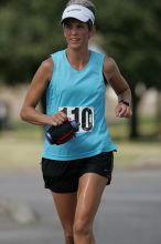 Karen Pearce placed second in her age groun at the Army Dillo half-marathon and 32K race.

Filename: SRM_20080921_1056467.jpg
Aperture: f/4.0
Shutter Speed: 1/2500
Body: Canon EOS-1D Mark II
Lens: Canon EF 300mm f/2.8 L IS
