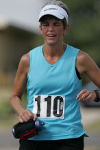 Karen Pearce placed second in her age groun at the Army Dillo half-marathon and 32K race.

Filename: SRM_20080921_1056484.jpg
Aperture: f/4.0
Shutter Speed: 1/2500
Body: Canon EOS-1D Mark II
Lens: Canon EF 300mm f/2.8 L IS
