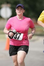 Meredith Cohen running the Army Dillo half-marathon and 32K race.

Filename: SRM_20080921_1116000.jpg
Aperture: f/4.0
Shutter Speed: 1/2000
Body: Canon EOS-1D Mark II
Lens: Canon EF 300mm f/2.8 L IS