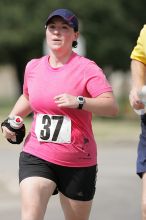 Meredith Cohen running the Army Dillo half-marathon and 32K race.

Filename: SRM_20080921_1116001.jpg
Aperture: f/4.0
Shutter Speed: 1/2000
Body: Canon EOS-1D Mark II
Lens: Canon EF 300mm f/2.8 L IS