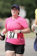 Meredith Cohen running the Army Dillo half-marathon and 32K race.

Filename: SRM_20080921_1116002.jpg
Aperture: f/4.0
Shutter Speed: 1/2000
Body: Canon EOS-1D Mark II
Lens: Canon EF 300mm f/2.8 L IS