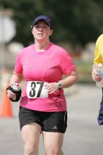 Meredith Cohen running the Army Dillo half-marathon and 32K race.

Filename: SRM_20080921_1116009.jpg
Aperture: f/4.0
Shutter Speed: 1/2000
Body: Canon EOS-1D Mark II
Lens: Canon EF 300mm f/2.8 L IS