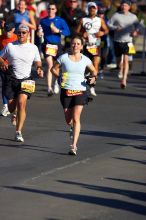 Beth Marek, bib #4236, completed the course in 3:38:21, a Boston Marathon qualifying time.  The first annual San Antonio Rock and Roll Marathon, Sunday, November 16, 2008.

Filename: SRM_20081116_08515206.jpg
Aperture: f/4.0
Shutter Speed: 1/2500
Body: Canon EOS-1D Mark II
Lens: Canon EF 300mm f/2.8 L IS