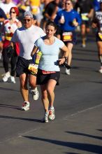 Beth Marek, bib #4236, completed the course in 3:38:21, a Boston Marathon qualifying time.  The first annual San Antonio Rock and Roll Marathon, Sunday, November 16, 2008.

Filename: SRM_20081116_08515610.jpg
Aperture: f/4.0
Shutter Speed: 1/3200
Body: Canon EOS-1D Mark II
Lens: Canon EF 300mm f/2.8 L IS