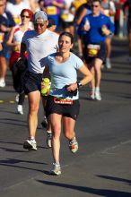 Beth Marek, bib #4236, completed the course in 3:38:21, a Boston Marathon qualifying time.  The first annual San Antonio Rock and Roll Marathon, Sunday, November 16, 2008.

Filename: SRM_20081116_08520013.jpg
Aperture: f/4.0
Shutter Speed: 1/3200
Body: Canon EOS-1D Mark II
Lens: Canon EF 300mm f/2.8 L IS