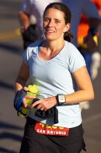 Beth Marek, bib #4236, completed the course in 3:38:21, a Boston Marathon qualifying time.  The first annual San Antonio Rock and Roll Marathon, Sunday, November 16, 2008.

Filename: SRM_20081116_08521227.jpg
Aperture: f/4.0
Shutter Speed: 1/3200
Body: Canon EOS-1D Mark II
Lens: Canon EF 300mm f/2.8 L IS