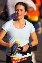 Beth Marek, bib #4236, completed the course in 3:38:21, a Boston Marathon qualifying time.  The first annual San Antonio Rock and Roll Marathon, Sunday, November 16, 2008.

Filename: SRM_20081116_08521428.jpg
Aperture: f/4.0
Shutter Speed: 1/4000
Body: Canon EOS-1D Mark II
Lens: Canon EF 300mm f/2.8 L IS