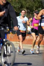 Beth Marek, bib #4236, completed the course in 3:38:21, a Boston Marathon qualifying time.  The first annual San Antonio Rock and Roll Marathon, Sunday, November 16, 2008.

Filename: SRM_20081116_11152851.jpg
Aperture: f/4.0
Shutter Speed: 1/2500
Body: Canon EOS-1D Mark II
Lens: Canon EF 300mm f/2.8 L IS