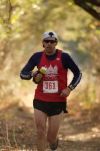 Paul Terranova placed first in his age group, fourth overall in the 25K at the Bandera 25K, 50K, and 100K trail race in Bandera, TX on Saturday, January 10, 2009.

Filename: SRM_20090110_09023649.jpg
Aperture: f/2.8
Shutter Speed: 1/400
Body: Canon EOS-1D Mark II
Lens: Canon EF 300mm f/2.8 L IS