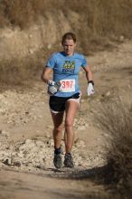 Bandera 25K, 50K, and 100K trail race in Bandera, TX on Saturday, January 10, 2009.

Filename: SRM_20090110_09485080.jpg
Aperture: f/4.0
Shutter Speed: 1/5000
Body: Canon EOS-1D Mark II
Lens: Canon EF 300mm f/2.8 L IS