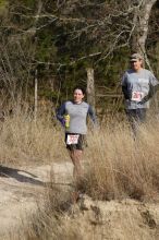 Beth Marek placed 5th in her age group in the 25K at the. Bandera 25K, 50K, and 100K trail race in Bandera, TX on Saturday, January 10, 2009.

Filename: SRM_20090110_10173689.jpg
Aperture: f/5.6
Shutter Speed: 1/640
Body: Canon EOS-1D Mark II
Lens: Canon EF 300mm f/2.8 L IS