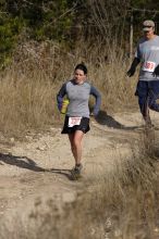 Beth Marek placed 5th in her age group in the 25K at the. Bandera 25K, 50K, and 100K trail race in Bandera, TX on Saturday, January 10, 2009.

Filename: SRM_20090110_10173890.jpg
Aperture: f/5.6
Shutter Speed: 1/800
Body: Canon EOS-1D Mark II
Lens: Canon EF 300mm f/2.8 L IS
