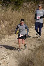 Beth Marek placed 5th in her age group in the 25K at the. Bandera 25K, 50K, and 100K trail race in Bandera, TX on Saturday, January 10, 2009.

Filename: SRM_20090110_10174493.jpg
Aperture: f/5.6
Shutter Speed: 1/1000
Body: Canon EOS-1D Mark II
Lens: Canon EF 300mm f/2.8 L IS