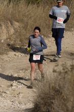 Beth Marek placed 5th in her age group in the 25K at the. Bandera 25K, 50K, and 100K trail race in Bandera, TX on Saturday, January 10, 2009.

Filename: SRM_20090110_10174895.jpg
Aperture: f/5.6
Shutter Speed: 1/1000
Body: Canon EOS-1D Mark II
Lens: Canon EF 300mm f/2.8 L IS