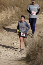 Beth Marek placed 5th in her age group in the 25K at the. Bandera 25K, 50K, and 100K trail race in Bandera, TX on Saturday, January 10, 2009.

Filename: SRM_20090110_10175296.jpg
Aperture: f/5.6
Shutter Speed: 1/1000
Body: Canon EOS-1D Mark II
Lens: Canon EF 300mm f/2.8 L IS