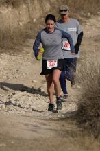 Beth Marek placed 5th in her age group in the 25K at the. Bandera 25K, 50K, and 100K trail race in Bandera, TX on Saturday, January 10, 2009.

Filename: SRM_20090110_10175899.jpg
Aperture: f/5.6
Shutter Speed: 1/1000
Body: Canon EOS-1D Mark II
Lens: Canon EF 300mm f/2.8 L IS