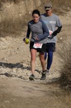 Beth Marek placed 5th in her age group in the 25K at the. Bandera 25K, 50K, and 100K trail race in Bandera, TX on Saturday, January 10, 2009.

Filename: SRM_20090110_10180201.jpg
Aperture: f/5.6
Shutter Speed: 1/1000
Body: Canon EOS-1D Mark II
Lens: Canon EF 300mm f/2.8 L IS