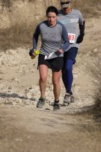 Beth Marek placed 5th in her age group in the 25K at the. Bandera 25K, 50K, and 100K trail race in Bandera, TX on Saturday, January 10, 2009.

Filename: SRM_20090110_10180402.jpg
Aperture: f/5.6
Shutter Speed: 1/800
Body: Canon EOS-1D Mark II
Lens: Canon EF 300mm f/2.8 L IS