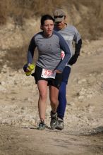 Beth Marek placed 5th in her age group in the 25K at the. Bandera 25K, 50K, and 100K trail race in Bandera, TX on Saturday, January 10, 2009.

Filename: SRM_20090110_10180804.jpg
Aperture: f/5.6
Shutter Speed: 1/1000
Body: Canon EOS-1D Mark II
Lens: Canon EF 300mm f/2.8 L IS