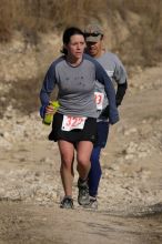 Beth Marek placed 5th in her age group in the 25K at the. Bandera 25K, 50K, and 100K trail race in Bandera, TX on Saturday, January 10, 2009.

Filename: SRM_20090110_10181005.jpg
Aperture: f/5.6
Shutter Speed: 1/1000
Body: Canon EOS-1D Mark II
Lens: Canon EF 300mm f/2.8 L IS