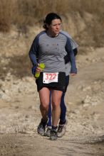 Beth Marek placed 5th in her age group in the 25K at the. Bandera 25K, 50K, and 100K trail race in Bandera, TX on Saturday, January 10, 2009.

Filename: SRM_20090110_10181206.jpg
Aperture: f/5.6
Shutter Speed: 1/1000
Body: Canon EOS-1D Mark II
Lens: Canon EF 300mm f/2.8 L IS