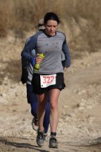 Beth Marek placed 5th in her age group in the 25K at the. Bandera 25K, 50K, and 100K trail race in Bandera, TX on Saturday, January 10, 2009.

Filename: SRM_20090110_10181608.jpg
Aperture: f/5.6
Shutter Speed: 1/800
Body: Canon EOS-1D Mark II
Lens: Canon EF 300mm f/2.8 L IS
