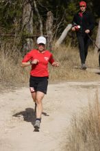 Meredith Terranova placed second overall in the 50K at the Bandera 25K, 50K, and 100K trail race in Bandera, TX on Saturday, January 10, 2009.

Filename: SRM_20090110_12422226.jpg
Aperture: f/5.6
Shutter Speed: 1/800
Body: Canon EOS-1D Mark II
Lens: Canon EF 300mm f/2.8 L IS