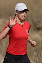 Meredith Terranova placed second overall in the 50K at the Bandera 25K, 50K, and 100K trail race in Bandera, TX on Saturday, January 10, 2009.

Filename: SRM_20090110_12424236.jpg
Aperture: f/5.6
Shutter Speed: 1/800
Body: Canon EOS-1D Mark II
Lens: Canon EF 300mm f/2.8 L IS