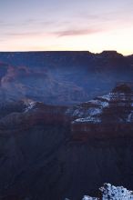 First sunrise of the new year at the south rim of the Grand Canyon, Thursday January 1, 2009.  The temperature was as low as 15 F the night before with a foot and a half of snow on the ground.  Luckily sunrise wasn't until 7:40.

Filename: SRM_20090101_07194892.JPG
Aperture: f/11.0
Shutter Speed: 10/1
Body: Canon EOS-1D Mark II
Lens: Canon EF 16-35mm f/2.8 L