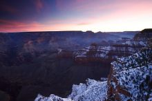 First sunrise of the new year at the south rim of the Grand Canyon, Thursday January 1, 2009.  The temperature was as low as 15 F the night before with a foot and a half of snow on the ground.  Luckily sunrise wasn't until 7:40.

Filename: SRM_20090101_07245396.JPG
Aperture: f/11.0
Shutter Speed: 4/1
Body: Canon EOS-1D Mark II
Lens: Canon EF 16-35mm f/2.8 L