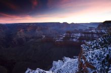 First sunrise of the new year at the south rim of the Grand Canyon, Thursday January 1, 2009.  The temperature was as low as 15 F the night before with a foot and a half of snow on the ground.  Luckily sunrise wasn't until 7:40.

Filename: SRM_20090101_07265998.JPG
Aperture: f/16.0
Shutter Speed: 5/1
Body: Canon EOS-1D Mark II
Lens: Canon EF 16-35mm f/2.8 L