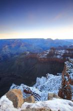 First sunrise of the new year at the south rim of the Grand Canyon, Thursday January 1, 2009.  The temperature was as low as 15 F the night before with a foot and a half of snow on the ground.  Luckily sunrise wasn't until 7:40.

Filename: SRM_20090101_07385309.JPG
Aperture: f/16.0
Shutter Speed: 16/10
Body: Canon EOS-1D Mark II
Lens: Canon EF 16-35mm f/2.8 L