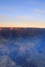 First sunrise of the new year at the south rim of the Grand Canyon, Thursday January 1, 2009.  The temperature was as low as 15 F the night before with a foot and a half of snow on the ground.  Luckily sunrise wasn't until 7:40.

Filename: SRM_20090101_07423111.JPG
Aperture: f/16.0
Shutter Speed: 4/1
Body: Canon EOS-1D Mark II
Lens: Canon EF 16-35mm f/2.8 L