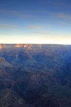 First sunrise of the new year at the south rim of the Grand Canyon, Thursday January 1, 2009.  The temperature was as low as 15 F the night before with a foot and a half of snow on the ground.  Luckily sunrise wasn't until 7:40.

Filename: SRM_20090101_07432212.JPG
Aperture: f/16.0
Shutter Speed: 13/10
Body: Canon EOS-1D Mark II
Lens: Canon EF 16-35mm f/2.8 L