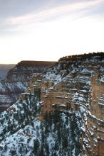 First sunrise of the new year at the south rim of the Grand Canyon, Thursday January 1, 2009.  The temperature was as low as 15 F the night before with a foot and a half of snow on the ground.  Luckily sunrise wasn't until 7:40.

Filename: SRM_20090101_07494119.JPG
Aperture: f/16.0
Shutter Speed: 16/10
Body: Canon EOS-1D Mark II
Lens: Canon EF 16-35mm f/2.8 L