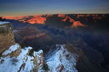 First sunrise of the new year at the south rim of the Grand Canyon, Thursday January 1, 2009.  The temperature was as low as 15 F the night before with a foot and a half of snow on the ground.  Luckily sunrise wasn't until 7:40.

Filename: SRM_20090101_07541323.JPG
Aperture: f/16.0
Shutter Speed: 1/1
Body: Canon EOS-1D Mark II
Lens: Canon EF 16-35mm f/2.8 L