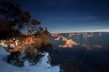 First sunrise of the new year at the south rim of the Grand Canyon, Thursday January 1, 2009.  The temperature was as low as 15 F the night before with a foot and a half of snow on the ground.  Luckily sunrise wasn't until 7:40.

Filename: SRM_20090101_07572224.JPG
Aperture: f/14.0
Shutter Speed: 1/13
Body: Canon EOS-1D Mark II
Lens: Canon EF 16-35mm f/2.8 L