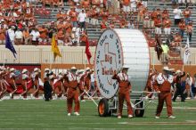 The UT marching band takes the field before the Arkansas football game.  The University of Texas football team defeated the Arkansas Razorbacks with a score of 52-10 in Austin, TX on Saturday, September 27, 2008.

Filename: SRM_20080927_14183009.jpg
Aperture: f/5.6
Shutter Speed: 1/2000
Body: Canon EOS-1D Mark II
Lens: Canon EF 300mm f/2.8 L IS