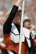 The UT marching band takes the field before the Arkansas football game.  The University of Texas football team defeated the Arkansas Razorbacks with a score of 52-10 in Austin, TX on Saturday, September 27, 2008.

Filename: SRM_20080927_14202226.jpg
Aperture: f/5.6
Shutter Speed: 1/1600
Body: Canon EOS-1D Mark II
Lens: Canon EF 300mm f/2.8 L IS