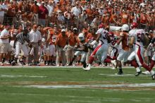 The University of Texas football team defeated the Arkansas Razorbacks with a score of 52-10 in Austin, TX on Saturday, September 27, 2008.

Filename: SRM_20080927_14384070.jpg
Aperture: f/5.6
Shutter Speed: 1/3200
Body: Canon EOS-1D Mark II
Lens: Canon EF 300mm f/2.8 L IS