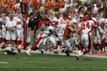 The University of Texas football team defeated the Arkansas Razorbacks with a score of 52-10 in Austin, TX on Saturday, September 27, 2008.

Filename: SRM_20080927_14400282.jpg
Aperture: f/5.6
Shutter Speed: 1/4000
Body: Canon EOS-1D Mark II
Lens: Canon EF 300mm f/2.8 L IS