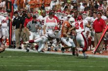 The University of Texas football team defeated the Arkansas Razorbacks with a score of 52-10 in Austin, TX on Saturday, September 27, 2008.

Filename: SRM_20080927_14400283.jpg
Aperture: f/5.6
Shutter Speed: 1/4000
Body: Canon EOS-1D Mark II
Lens: Canon EF 300mm f/2.8 L IS