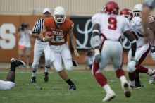 The University of Texas football team defeated the Arkansas Razorbacks with a score of 52-10 in Austin, TX on Saturday, September 27, 2008.

Filename: SRM_20080927_14552828.jpg
Aperture: f/5.6
Shutter Speed: 1/1000
Body: Canon EOS-1D Mark II
Lens: Canon EF 300mm f/2.8 L IS