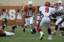 The University of Texas football team defeated the Arkansas Razorbacks with a score of 52-10 in Austin, TX on Saturday, September 27, 2008.

Filename: SRM_20080927_14552829.jpg
Aperture: f/5.6
Shutter Speed: 1/1000
Body: Canon EOS-1D Mark II
Lens: Canon EF 300mm f/2.8 L IS