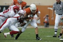 The University of Texas football team defeated the Arkansas Razorbacks with a score of 52-10 in Austin, TX on Saturday, September 27, 2008.

Filename: SRM_20080927_14553036.jpg
Aperture: f/5.6
Shutter Speed: 1/1000
Body: Canon EOS-1D Mark II
Lens: Canon EF 300mm f/2.8 L IS