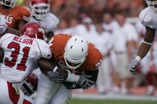 The University of Texas football team defeated the Arkansas Razorbacks with a score of 52-10 in Austin, TX on Saturday, September 27, 2008.

Filename: SRM_20080927_14575253.jpg
Aperture: f/5.6
Shutter Speed: 1/1250
Body: Canon EOS-1D Mark II
Lens: Canon EF 300mm f/2.8 L IS