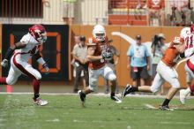 The University of Texas football team defeated the Arkansas Razorbacks with a score of 52-10 in Austin, TX on Saturday, September 27, 2008.

Filename: SRM_20080927_15090685.jpg
Aperture: f/5.6
Shutter Speed: 1/1600
Body: Canon EOS-1D Mark II
Lens: Canon EF 300mm f/2.8 L IS